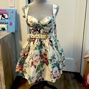 Zimmerman size 1 Med in USA beautiful dress with belt and sleeves are adjustable